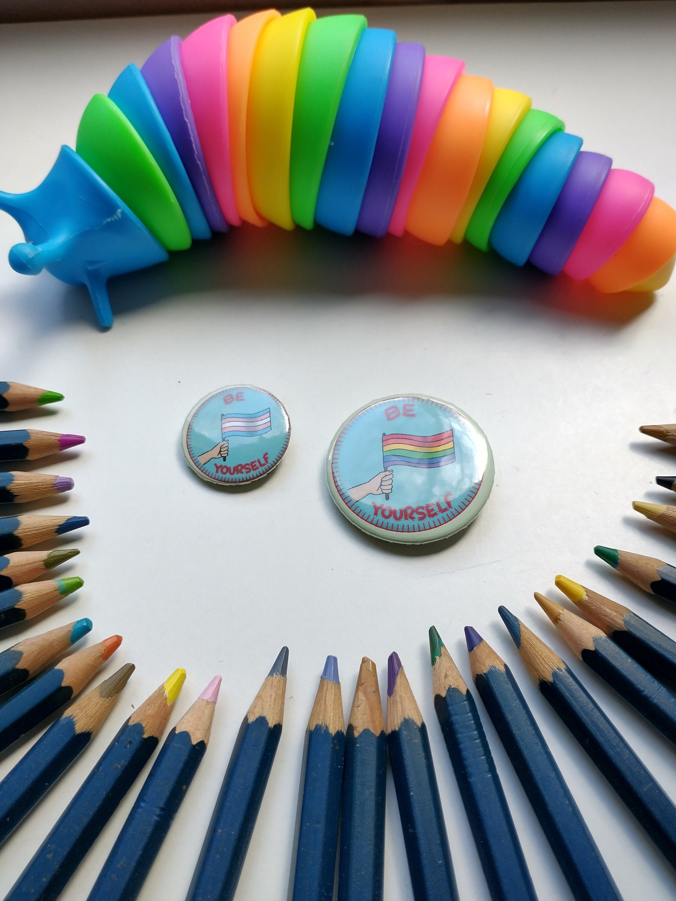 be yourself pride flag/trans flag badge/pin