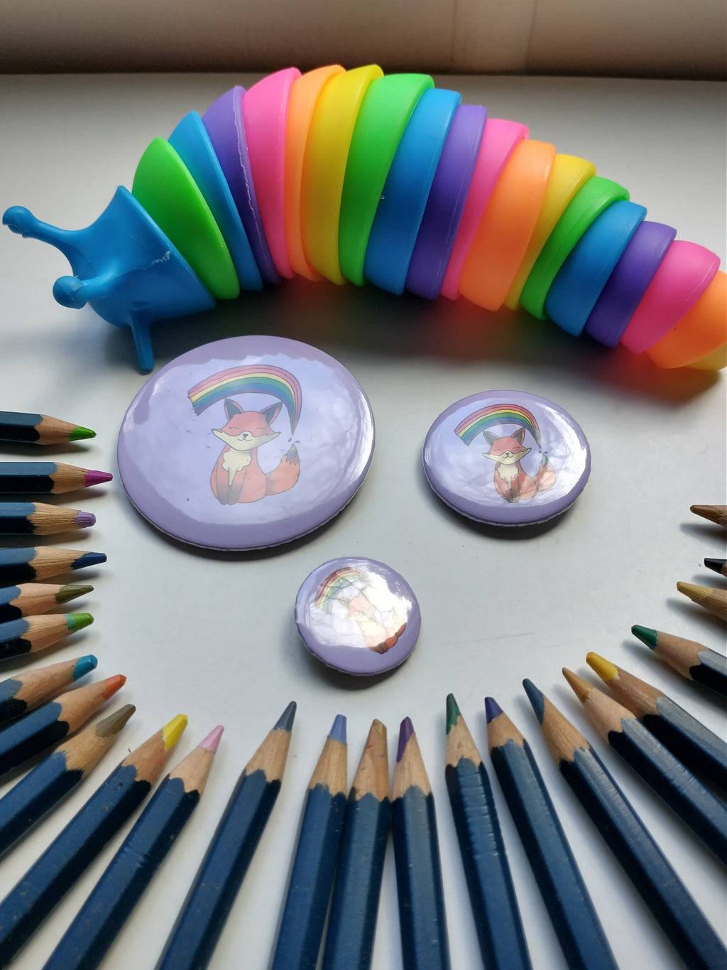 Rainbow fox badge/pin